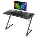 Tangkula Gaming Computer Desk, Z-Shaped Home Office Computer Table with LED Lights & Large Carbon Fiber Surface, Ergonomic Gamer Workstation, Writing Desk for Home Office